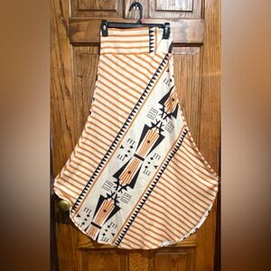 White, cream, and black skirt featuring a southwest inspired design.